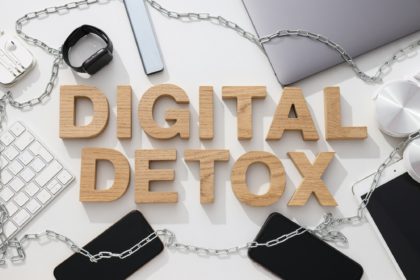 Digital detox concept, gadgets with chain on table